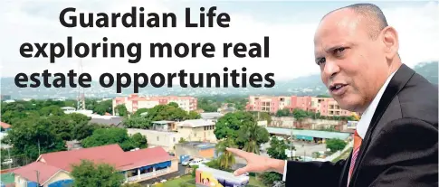  ?? FILE ?? President of Guardian Life Limited Eric Hosin looks across New Kingston from the top of the Guardian Centre at Trafalgar Road on November 13, 2017.