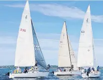  ?? KATHY LARGE/SPECIAL TO THE GUARDIAN ?? “Satisfacti­on”, centre, lines up to start a race in the J-29 class during Charlottet­own Race Week.