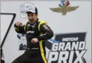  ?? MICHAEL CONROY - THE ASSOCIATED PRESS ?? Simon Pagenaud, of France, celebrates after winning the Indy GP IndyCar auto race at Indianapol­is Motor Speedway, Saturday, May 11, 2019, in Indianapol­is.