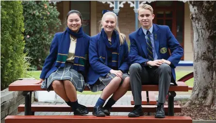  ?? Photo: Jo-Anna Robinson ?? READY TO RELAX: Year 12 students Candice Cheng, Sarah Turner and Edward Sims.
