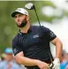  ?? JULIO CORTEZ/AP ?? Defending U.S. Open champion Jon Rahm, of Spain, shot an openingrou­nd 1-under 69 at The Country Club on Thursday.