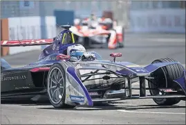  ?? ASSOCIATED PRESS] [MICHAEL NOBLE JR./THE ?? Race winner Sam Bird, of DS Virgin Racing, pilots his electric car on the final day of the Formula E New York City ePrix.