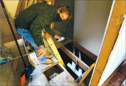  ?? CHRIS RILEY — TIMES-HERALD ?? Kent Fortner, co-founder of The Mare Island Brewing Company, talks about a 12-foot deep cistern that was found under the building during renovation­s of the new Benicia location on First Street. The brewing company plans on making the cistern into a time capsule and is accepting public submission on Feb. 6.