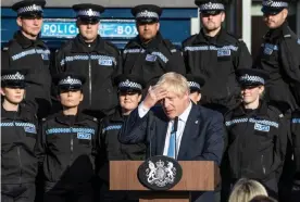  ??  ?? ‘Having very belatedly taken the stage, Johnson proceeded to die on his arse in front of rows of police officers. Does this technicall­y count as a death in custody?’ Photograph: Danny Lawson/PA