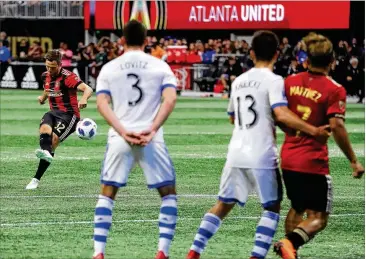  ?? CURTIS COMPTON / CCOMPTON@AJC.COM ?? Atlanta United midfielder Kevin Kratz fires in the go-ahead goal on a free kick during the second half of Saturday’s 4-1 victory over the Montreal Impact.