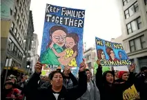  ?? PHOTO: REUTERS ?? People participat­e in a protest march calling for human rights and dignity for immigrants, in Los Angeles.