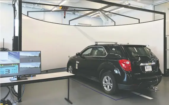  ?? UNIVERSITY OF WATERLOO ?? Instead of a desk chair, AVRIL students use a full-size, fully functional Chevy Equinox as part of its research into autonomous vehicle technology.