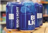  ?? AP PHOTO/JACQUELYN MARTIN ?? Starting next month, packages of Bud Light will have prominent labels showing the beer’s ingredient­s and calories as well as the amount of fat, carbohydra­tes and protein in a serving.
