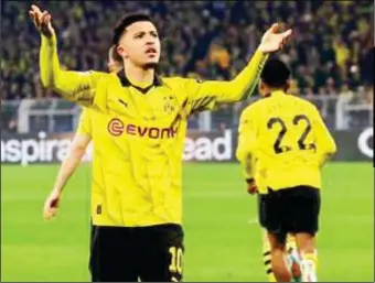  ?? ?? Borussia Dortmund ‘s Jordan Sancho celebratin­g after his match-winning goal against PSV Eindhoven sent the Bundesliga side into the quarter final of the UEFA Champions League ...last night