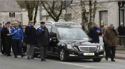  ??  ?? A guard of honour at the funeral of John Magee.