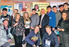  ??  ?? Kenneth Gibson MSP joins pupils and teachers from Arran High School at the North Ayrshire Employment Fayre.