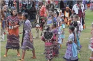  ?? ZHON KHA/USA TODAY NETWORK-WISCONSIN T'XER ?? Native Americans from various tribes gather Friday, July 20, 2018, to celebrate the Honor the Earth Pow-wow event at LCO School in Hayward, Wis.