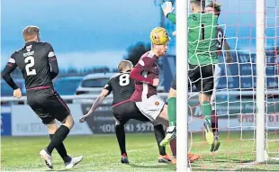  ?? Pictures: Graham Black. ?? Above: Bobby Linn scores direct from a corner. Top: Linn and team-mates celebrate with Ryan Wallace (No 9) after the striker fired the Lichties 3-1 ahead.