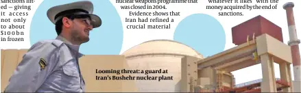  ?? ?? Breakout times are now far shorter than a few months ago
Looming threat: a guard at Iran’s Bushehr nuclear plant