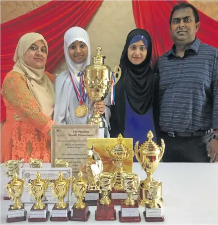  ?? Photo: Swashna Chand ?? Nasinu Muslim Primary School Dux Shahira Samiha Ali is flanked by (from left): mother, Shabnum Ali, sister Siddiqa Safiya Ali and father Shamsher Ali.