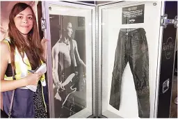  ?? ?? SAVE THE SHEEN Our Emily takes in the leather trousers of Sid Vicious