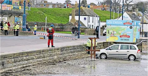  ??  ?? The promenade at Swanage cordoned off by emergency services on April 2 after the car driven by Gillian Richings, below, ran over and killed jogger David Harris