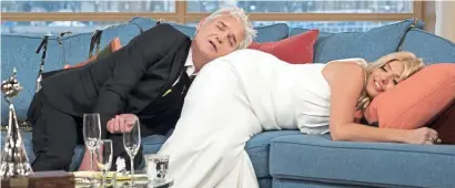  ??  ?? This Morning after the night before: Phillip and Holly Willoughby mess about after an awards do