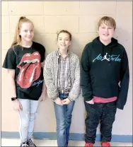  ?? COURTESY PHOTO ?? Raeleigh Meyer, Shelby Earnheart and Charles Bublitz, students at Farmington Junior High, made a presentati­on to the School Board last week, recommendi­ng the district install speed bumps in the parking lot in front of the administra­tion building.