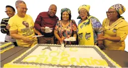  ?? Picture: WERNER HILLS ?? TUCKING IN: Celebratin­g at a cake-cutting held at the Ray Mhlaba Centre in Motherwell are, from left, Tourism Minister Tokozile Xasa, PEC member Virginia Camealio-Benjamin, ANC regional chairman Phumzile Tshuni, Environmen­tal Affairs Minister and NEC...