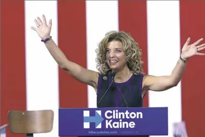  ?? Mary Altaffer/Associated Press ?? Debbie Wasserman Schultz, Democratic National Committee chairwoman, speaks Saturday at a campaign event for Hillary Clinton in Miami. On Sunday, Ms. Wasserman Schultz announced she would step down at the end of the party’s convention because of hacked...