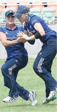  ?? IAN ALLEN/PHOTOGRAPH­ER ?? England captain Heather Knight (right) collides with Catherine Brunt as she takes a catch to dismiss West Indies captain Stafanie Taylor (out of picture) during the fourth ODI at Sabina Park on Sunday.