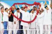  ??  ?? Congress workers felicitate party Vice-President Rahul Gandhi during a public meeting at Khatraj village of Kheda district in Gujarat on Monday.