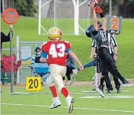  ?? SCOTT WOODLAND SPECIAL TO THE ST. CATHARINES STANDARD ?? A pass eludes Niagara receiver Wyatt Brown in Ontario Football League Tier 2 bantam action versus Cambridge.