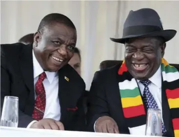  ?? ?? Vice-president Constantin­o Chiwenga and President Emmerson Mnangagwa