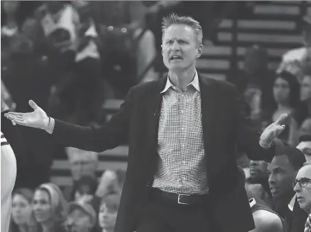  ?? BEN MARGOT/THE ASSOCIATED PRESS ?? Golden State Warriors coach Steve Kerr took a seat as an observer in the club’s win over Phoenix Monday night.