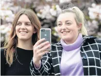 ?? PHOTO: LINDA ROBERTSON ?? Gearing up for Guangzhou . . . University of Otago Chinese language students (from left) Bridget Kirk, of Queenstown, and Megan Robinson, of Invercargi­ll, have won a trip to China after submitting a video about China on social media.