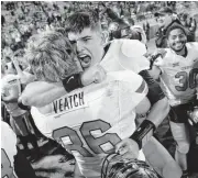  ?? [OKLAHOMAN ARCHIVES] ?? Mason Rudolph, center, led Oklahoma State to its last win over Oklahoma in 2014.