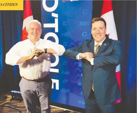  ?? O’TOOLE CAMPAIGN ?? Erin O’Toole and his Quebec leadership campaign chair, Alupa Clarke, prepare before the June 2020 French-language debate. Clarke helped
write O’Toole’s Quebec-specific platform, which has been credited with helping the candidate win over voters in that province.