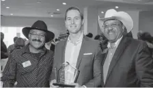  ??  ?? From left: Penfield Tate III, president of Delta Eta Boulé of Sigma Pi Phi Fraternity; Adam Fisher, representi­ng Morgan Stanley as Diamond Sponsor; and Hollis Booker, chairman of the board of the Delta Eta Boulé Foundation.