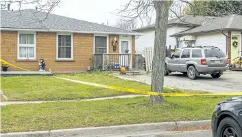  ?? BOB TYMCZYSZYN/ POSTMEDIA NEWS ?? Niagara Regional Police cruisers sit outside an address on Waters Avenue in Niagara Falls Tuesday. Police responded just before 7 a. m. to a man reportedly in distress.