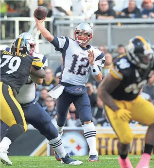  ?? JASON BRIDGE, USA TODAY SPORTS ?? Patriots quarterbac­k Tom Brady wasn’t spectacula­r against the Steelers on Sunday, throwing for 222 yards, but he did pass for two touchdowns and wasn’t intercepte­d.