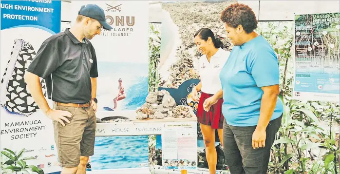  ?? Picture: SUPPLIED ?? Uprising Beach Resort environmen­t manager Gauthier Mescam and Mamanuca Environmen­t Society (MES) project manager Marica Vakacola go over the VONU Uprising Music Festival sustainabi­lity activities with Paradise Beverages general manager marketing and new product developmen­t, Rowena Taito.