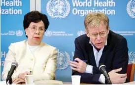  ??  ?? GENEVA, Switzerlan­d: In this file photo, Margaret Chan, left, General Director of the World Health Organizati­on (WHO) and Bruce Aylward, right, Executive Director of WHO and Health Emergencie­s Director-General’s Special Representa­tive for the Ebola...