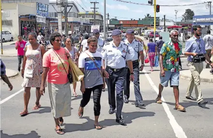  ?? Photo: Ronald Kumar. ?? Police Commission­er Brigadier-General Sitiveni Qiliho during the Commission­er’s beat in Nausori Town on December 28, 2017.