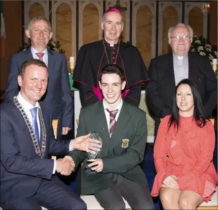  ??  ?? Student of the Year. Back: Principal Robert O’Callaghan, Bishop Denis Brennan and Mgr Joe McGrath. Front: PPU president Michael Breen, Student of the Year Dean O’Brien, and his mother Tracey.