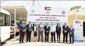  ?? KUNA photo ?? KRCS delivers two new vehicles to Iraqi Unified Medical Associatio­n. An official ceremony held at the Kuwait Embassy in Iraq headed by Ambassador Salem Al-Zamanan.