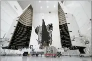  ?? JOHN RAOUX — THE ASSOCIATED PRESS FILE ?? NASA’s Lucy spacecraft with its housing at the AstroTech facility in Titusville, Fla., is shown on Sept. 19. It will be first space mission to explore a diverse population of small bodies known as the Jupiter Trojan asteroids.