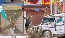  ?? AP FILE ?? Protesters throw rocks and bricks at a police vehicle in Srinagar on Friday.