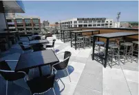  ?? MARSHALL GORBY / STAFF ?? A look inside the new rooftop bar and restaurant called The Foundry at the AC Hotel Dayton by Marriott. It overlooks Day Air Ball Park from several stories above East First Street.
