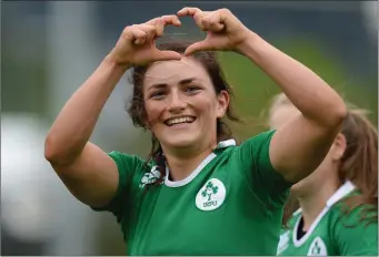  ??  ?? Lucy Mulhall signals to her team’s supporters following her side’s victory over China during the World Rugby Women’s Sevens Olympic Repechage in UCD last weekend.