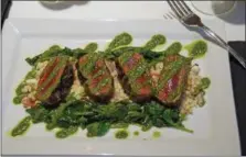  ?? PHOTO BY EMILY RYAN — FOR MEDIANEWS GROUP ?? Try the domestic lamb tenderloin, a new addition at the General Warren.