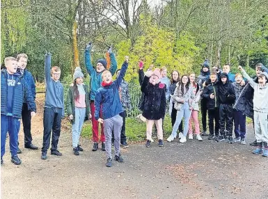  ?? ?? Loch at us Pupils during the school’s sponsored walk around Drumpellie­r Loch in aid of St Andrew’s Hospice