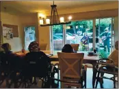  ?? COURTESY OF ANDREA CARTER ?? Visionary Assisted Living and In-Home Care resident enjoy a weekly concert from Andrea Carter and Darrin Michell.