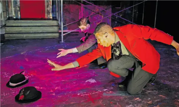  ?? John Lucas/ Edmonton Journal ?? Mohamed Ahmed and Malcolm Vick in a scene from W.P. Wagner High school’s production of Rosencrant­z and Guildenste­rn are Dead.