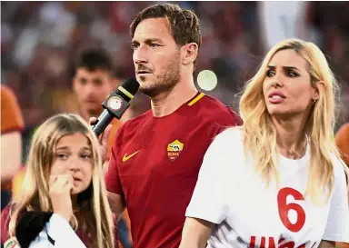  ??  ?? She’s the boss: Francesco Totti’s wife Ilary Blasi (right) has turned her nose up at a move to the Far East. — Reuters